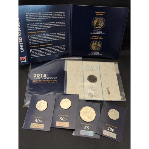 129 - A Collection of United Kingdom Commemorative Coins, including a Beatrix Potter 50p Collecting Pack a... 