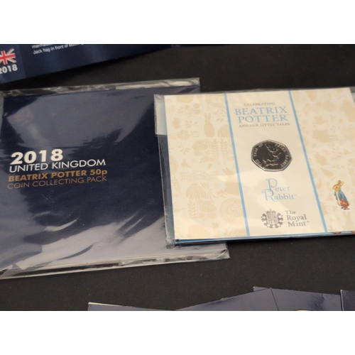 129 - A Collection of United Kingdom Commemorative Coins, including a Beatrix Potter 50p Collecting Pack a... 