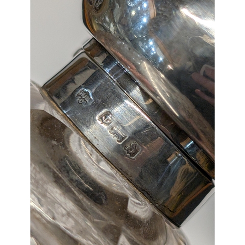 148 - A Pair of Late Victorian/Edwardian Cut Glass and Sterling Silver Vanity Bottles. 11.5cm H, 8.5cm dia