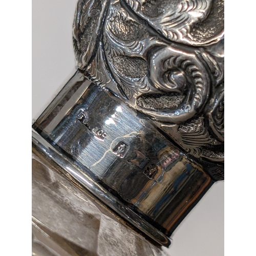 148 - A Pair of Late Victorian/Edwardian Cut Glass and Sterling Silver Vanity Bottles. 11.5cm H, 8.5cm dia