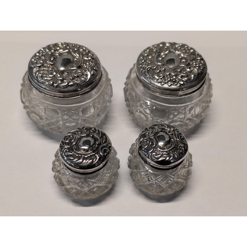 149 - A Set of Four Edwardian Sterling Silver and Cut Glass Dressing Table Jars, London 1906 / Birmingham ... 