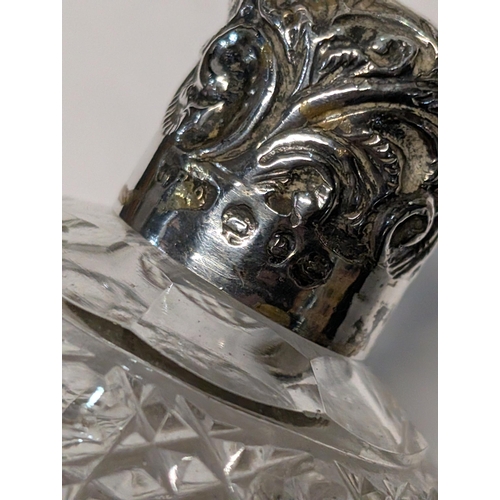 150 - A Group of Victorian and Edwardian Sterling Silver and Cut Glass Scent Bottles. Tallest H 12cm