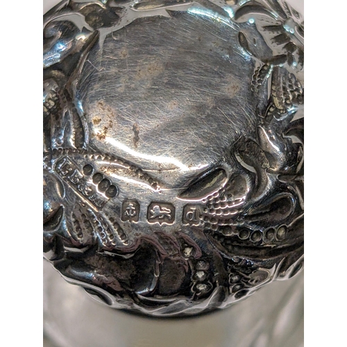 150 - A Group of Victorian and Edwardian Sterling Silver and Cut Glass Scent Bottles. Tallest H 12cm