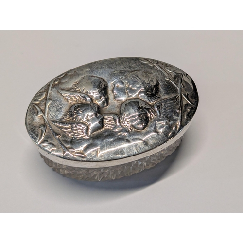 153 - Two English Sterling Silver and Cut Glass Repousse Dresser Boxes. Large H 4.5cm, L 12cm, W 6cm. Smal... 
