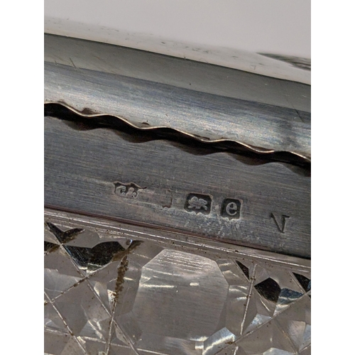 153 - Two English Sterling Silver and Cut Glass Repousse Dresser Boxes. Large H 4.5cm, L 12cm, W 6cm. Smal... 