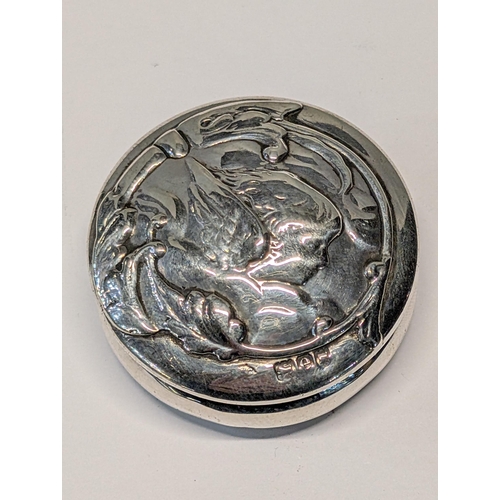 154 - An Art Nouveau Sterling Silver Pillbox with Cherub Motif William Comyns London 1900 29g