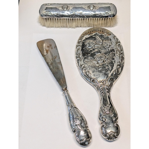 158 - Three Edwardian Sterling Silver Dressing Table items Including Chester Hallmarks. Shoe horn L 26cm. ... 