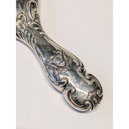 158 - Three Edwardian Sterling Silver Dressing Table items Including Chester Hallmarks. Shoe horn L 26cm. ... 