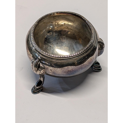 134 - A Pair of English Sterling Silver Three-Footed Salt Cellars. Worn Hallmarks, H 4cm, 7cm dia 124g