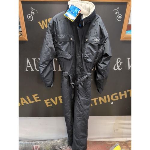 122 - FILA Ski Team Black One-Piece Ski Suit, new with tags Size USA 10