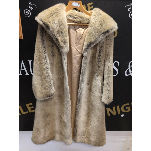 125 - An Astraka Fur Coat, Made in England