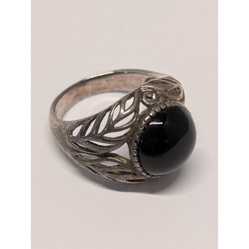 147 - Sterling Silver and Onyx Ring with Foliate Openwork