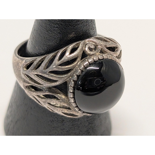 147 - Sterling Silver and Onyx Ring with Foliate Openwork