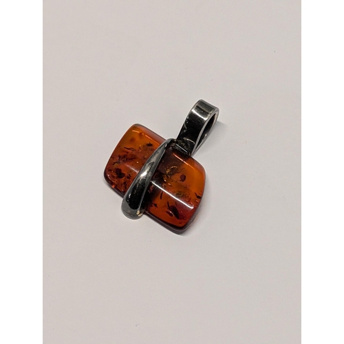 149 - A Sterling Silver and Baltic Amber Pendant