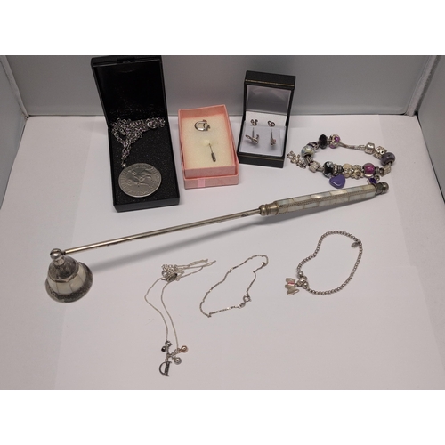 150 - An MOP Handle Candle Snuffer And Other Including Sterling Silver