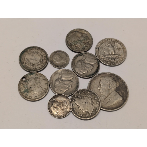 173 - A Group of Nine Assorted United States and Other Silver Coins