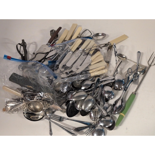 74 - A Large Assortment of Mixed Cutlery and Kitchen Utensils, including Silverplate and Stainless Steel,... 