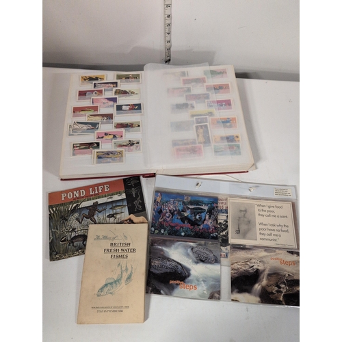 98 - A Stockbook with Picture Card Collection, Booklets, and Laminated Cards