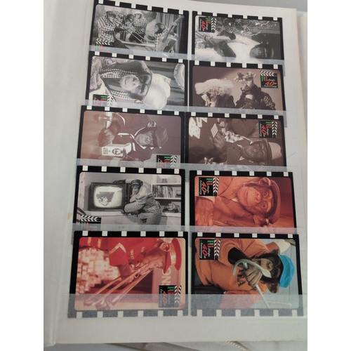 98 - A Stockbook with Picture Card Collection, Booklets, and Laminated Cards