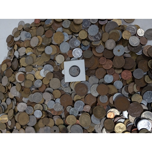 A large collection of assorted Foreign World Coins and Tokens. 10.7 kg