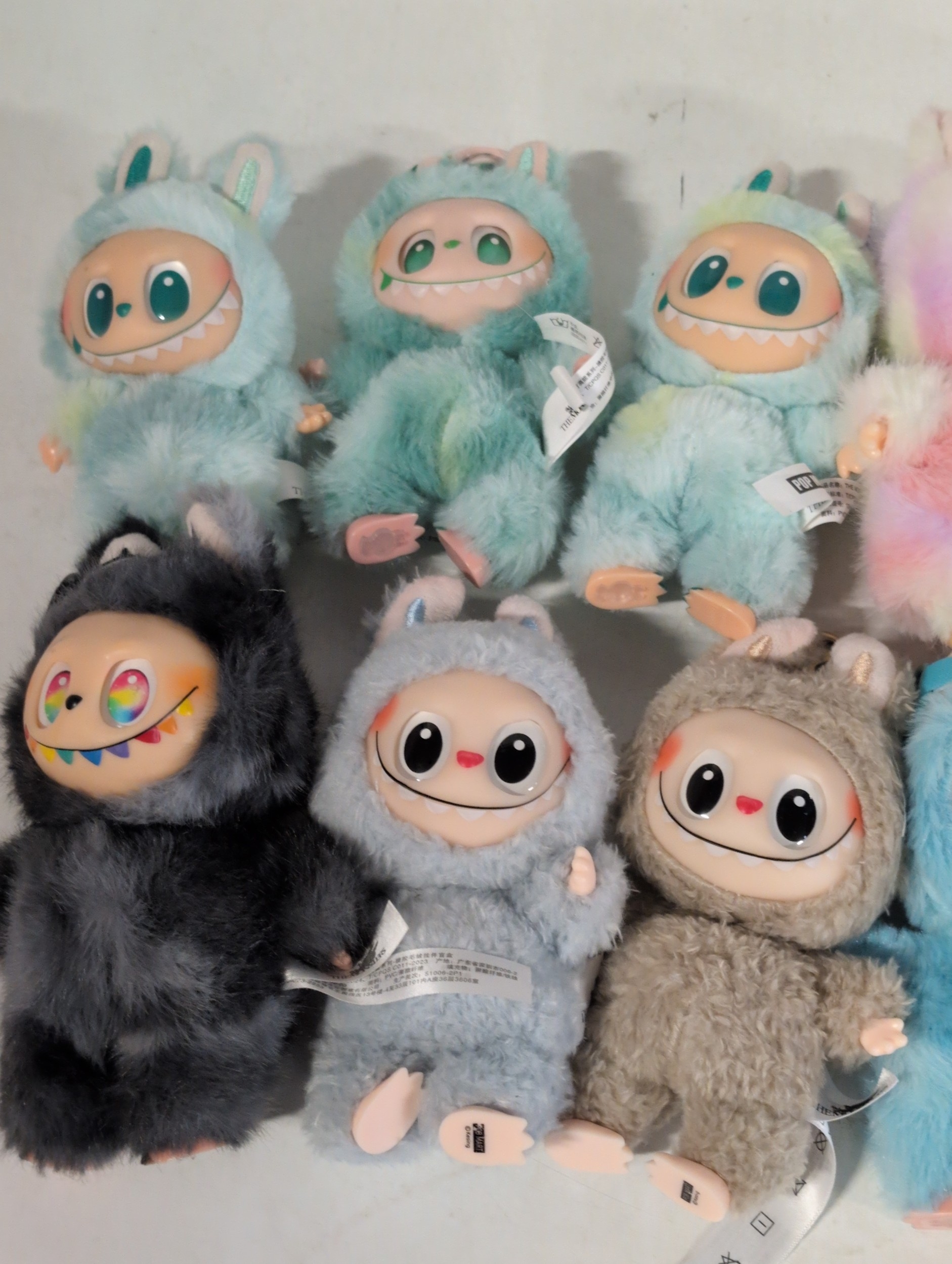 Selection of thirteen Labubu Style Plush Toys Including One Boxed