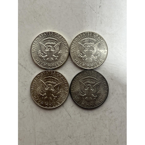 104 - A Group of US 1964 Kennedy Half Dollars