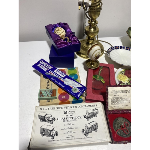 54 - An Assortment of Decorative Arts, Collectibles, and a Brass Table Lamp Base. No shipping.
