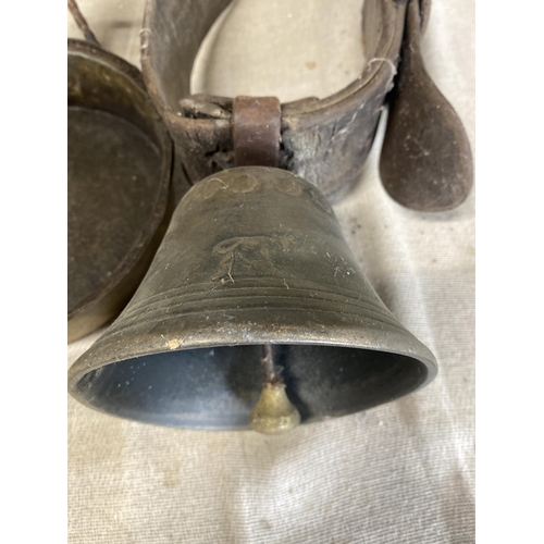 74 - Two Antique Rural Metalware Objects comprising a Cast Metal Livestock Bell and a Copper Melting Pan.... 