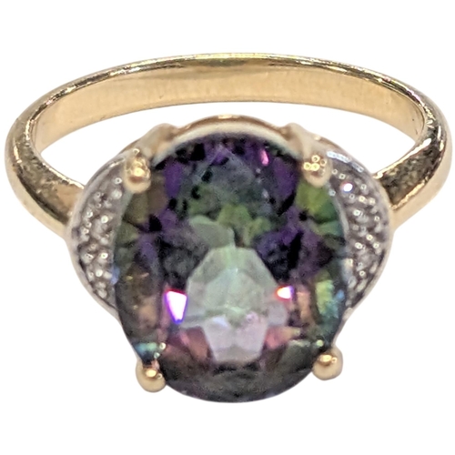 94 - A 9 carat yellow gold and mystic topaz cocktail ring. 4.35g, Size - N