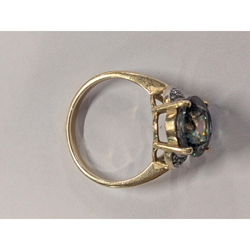 94 - A 9 carat yellow gold and mystic topaz cocktail ring. 4.35g, Size - N