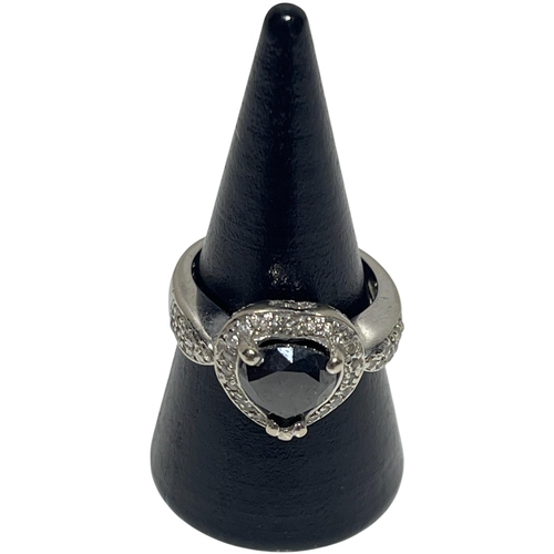 95 - A 14ct white gold ring with heart shaped black diamond centre piece surrounded by diamonds. size M. ... 