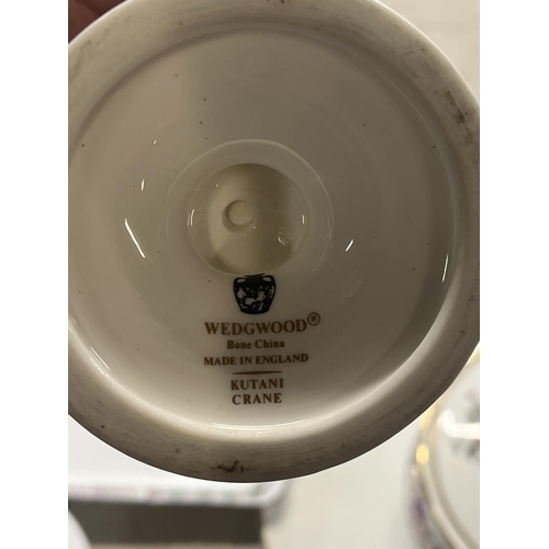 353 - A Collection of Wedgwood Bone China in the Kutani Crane Pattern. Approx 16 pieces. No shipping.