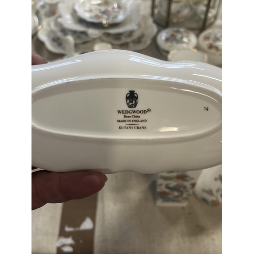 351 - An extensive collection of Wedgwood Kutani Crane pattern bone china tablewares. Approx 57 pieces. No... 