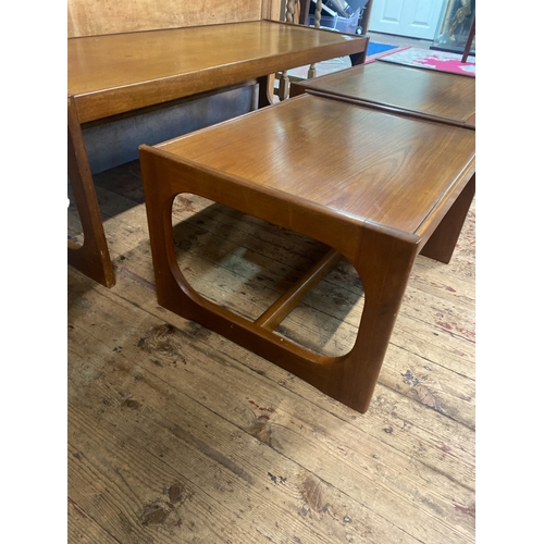84 - A Trio of Mid-Century Teak Nesting Tables comprising of a coffee table ( 122cm x 46cm x 39cm) and tw... 