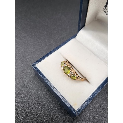 8 - 9ct Gold Cubic Zirconia & Green Stone Ring Fully Hallmarked Size N/O ( Weight 1.8g)