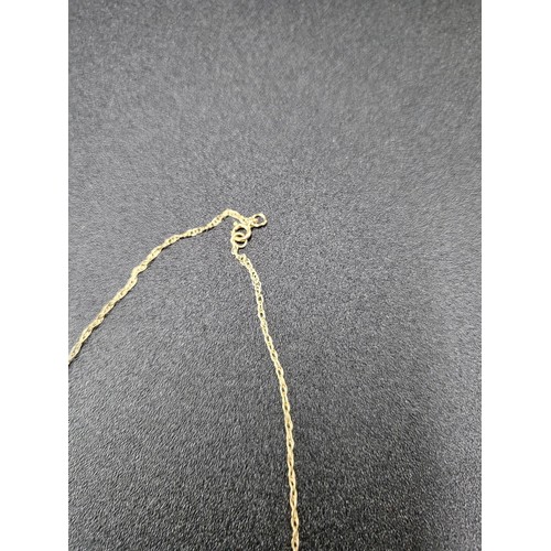 20 - 9ct Gold Locket on 9ct Gold Chain ( Weight 1.7g)