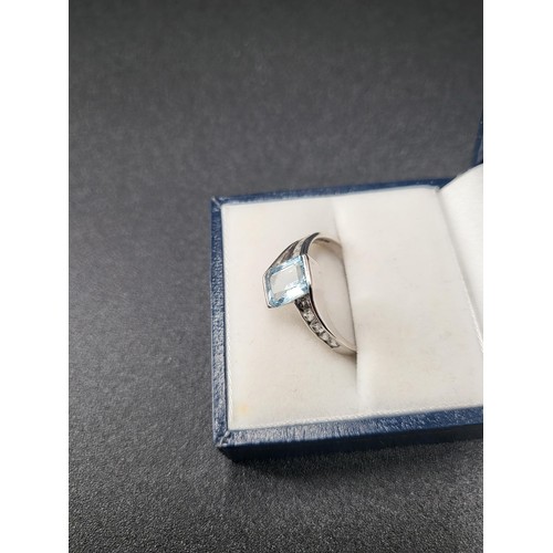 24 - 9ct White Gold Aquamarine & Cubic Zirconia Ring Fully Hallmarked Size Q (Weight 2.8g)