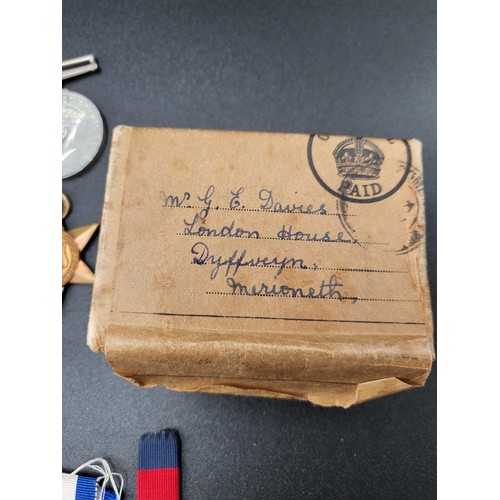 51 - Small Lot of Second World War Medals in Original Box Awarded To Mr G. E. Davies