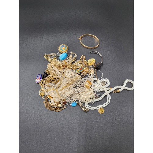 63 - Collection of Costume Jewellery Includes Beads, Chains, Brooches Etc