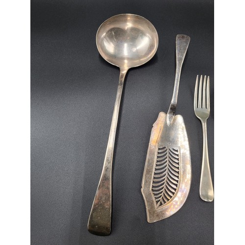 89 - Collection of Georgian Sterling Flatware Includes Large Ladle, Fish/Cake Slice, Fork, Two Spoons The... 