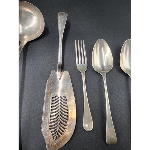 89 - Collection of Georgian Sterling Flatware Includes Large Ladle, Fish/Cake Slice, Fork, Two Spoons The... 