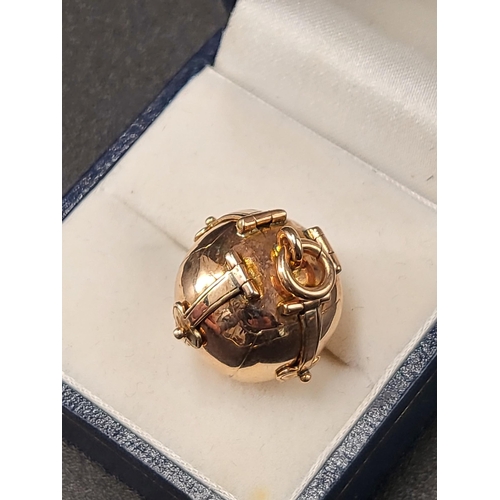 96 - 9ct Yellow Gold on Silver Masonic Ball / Orb / Fob Opens to Cross ( Weight 7.4g)