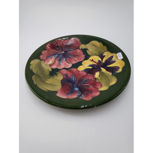 102 - William Moorcroft Hibiscus Pattern Plate No Damage Measures 26cm in Diameter