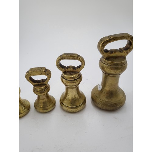 132 - Seven British Graduating Bell Weights Largest Measures 14cm Smallest Measure 3cm