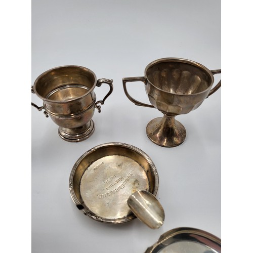 159 - Seven Pieces of Mixed silverware Includes Two Cups, Two Small Goblets, Three Ashtrays One With 1780 ... 