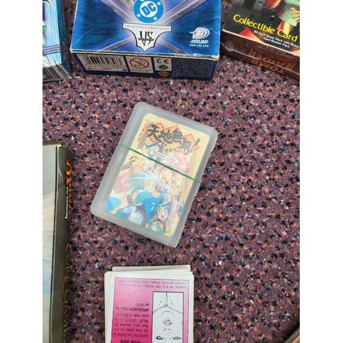 214 - Collection of Trading Cards & Games