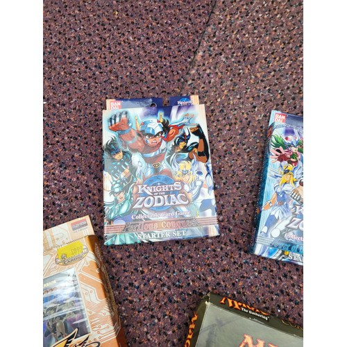 214 - Collection of Trading Cards & Games