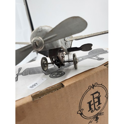 216 - Paya Airplane Clockwork Tinplate with Folding Wings in Original Box Does Wind But is Sticky Needs Oi... 