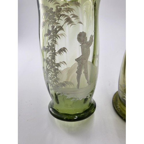 234 - Pair of Mary Gregory Glass Vases Depicting Young Boy on One & Young Lady on Other Chasing a Butt... 