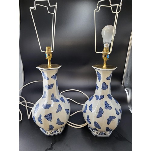 112 - Pair of of Oriental Blue & White Porcelain Vases with Butterfly Design Converted to Electric Lam... 